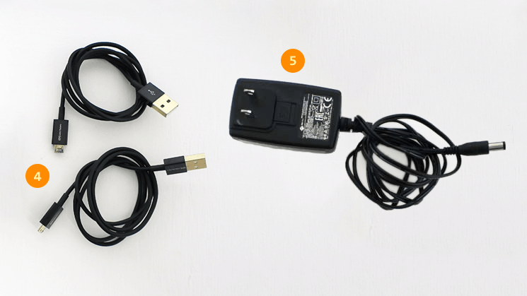 Additional cables include two micro-USB cables and DC power supply